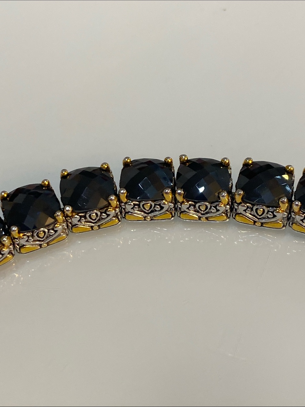 Gold and silver plated tennis bracelet jet black cubic zirconia